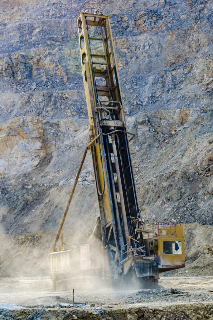 drilling rig in open pit mine